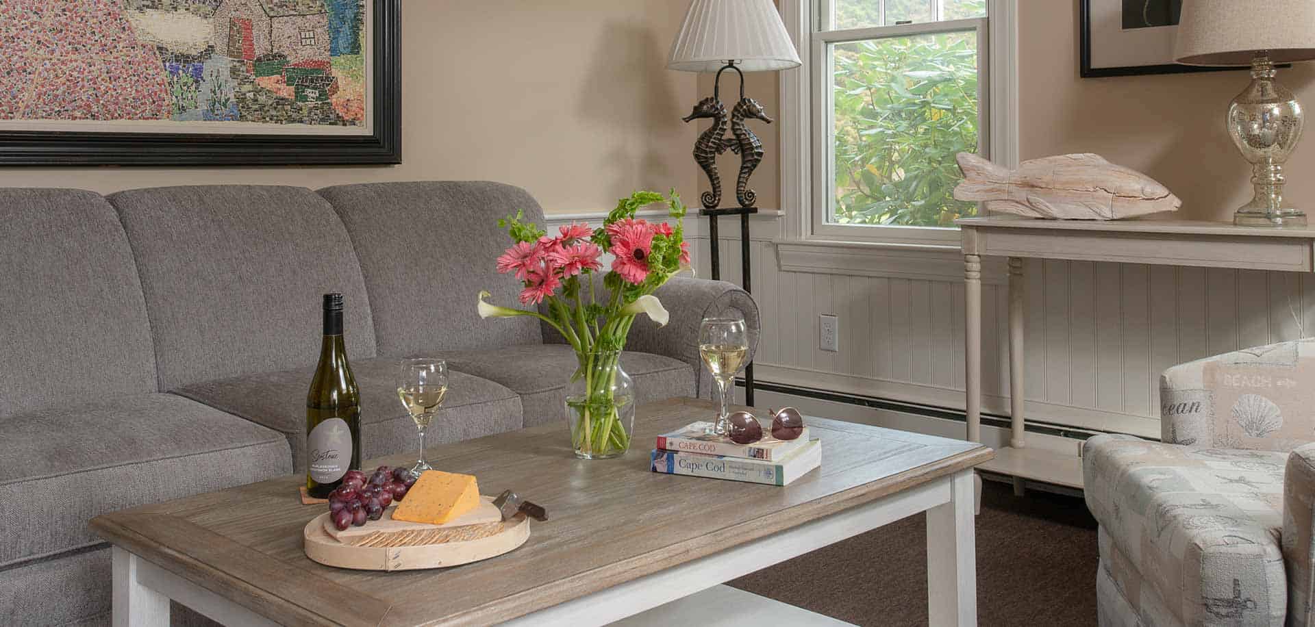 Nauset Suite sitting room with wine on table