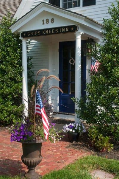 A USA flag in a flowerpot greets guests at our bed and breakfast